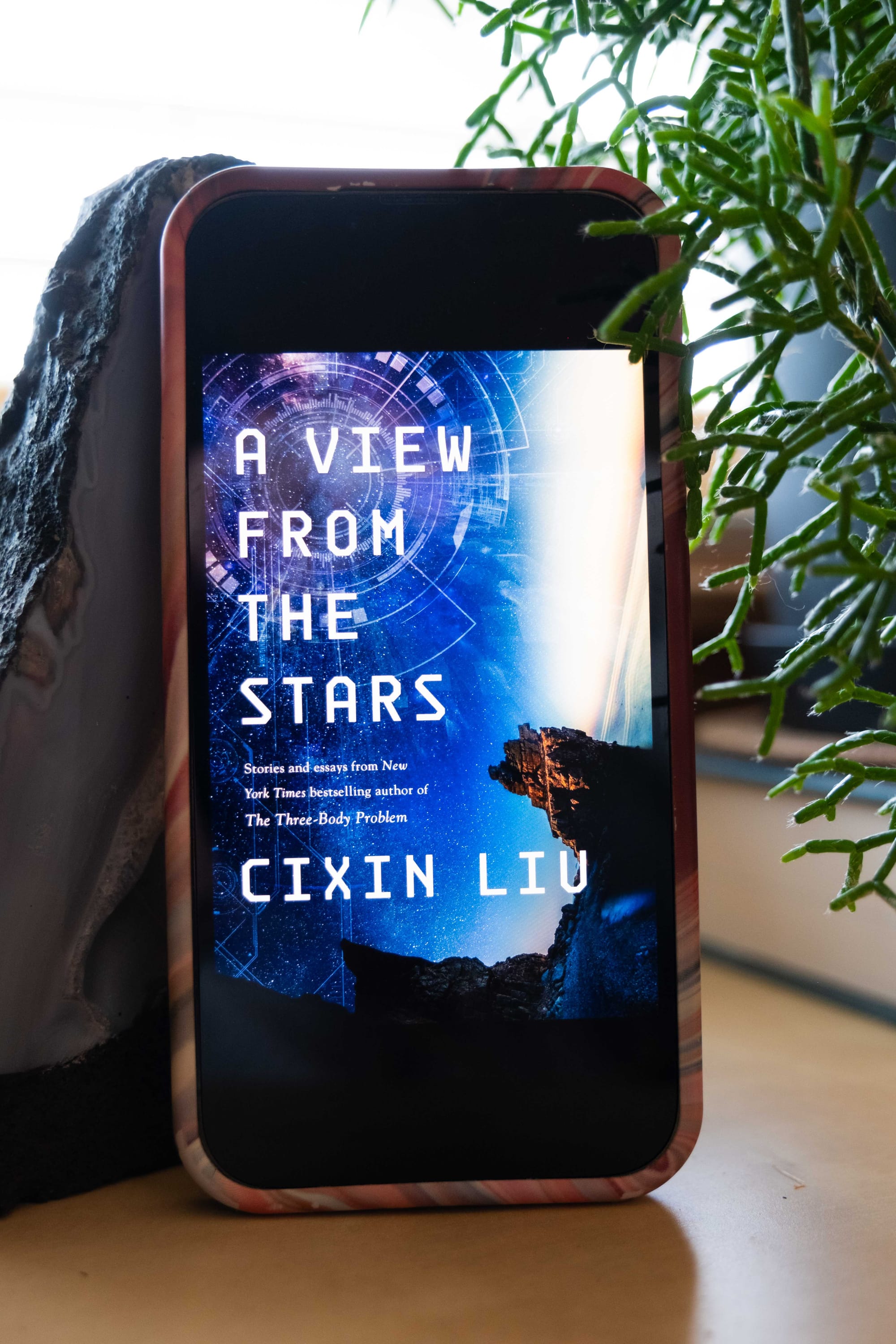 Book cover for A View from the Stars: Stories and Essays by Cixin Liu on an iPhone