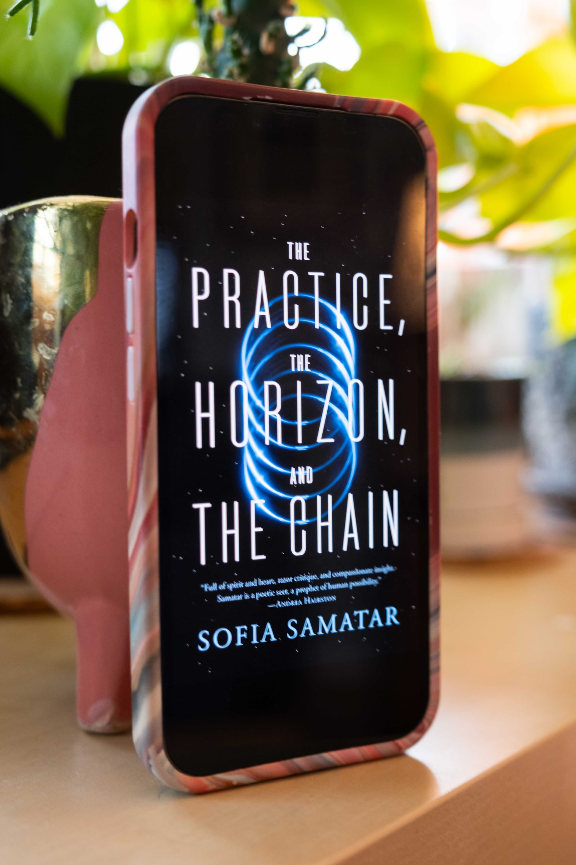 Book cover for The Practice, the Horizon, and the Chain by Sofia Samatar on an iPhone